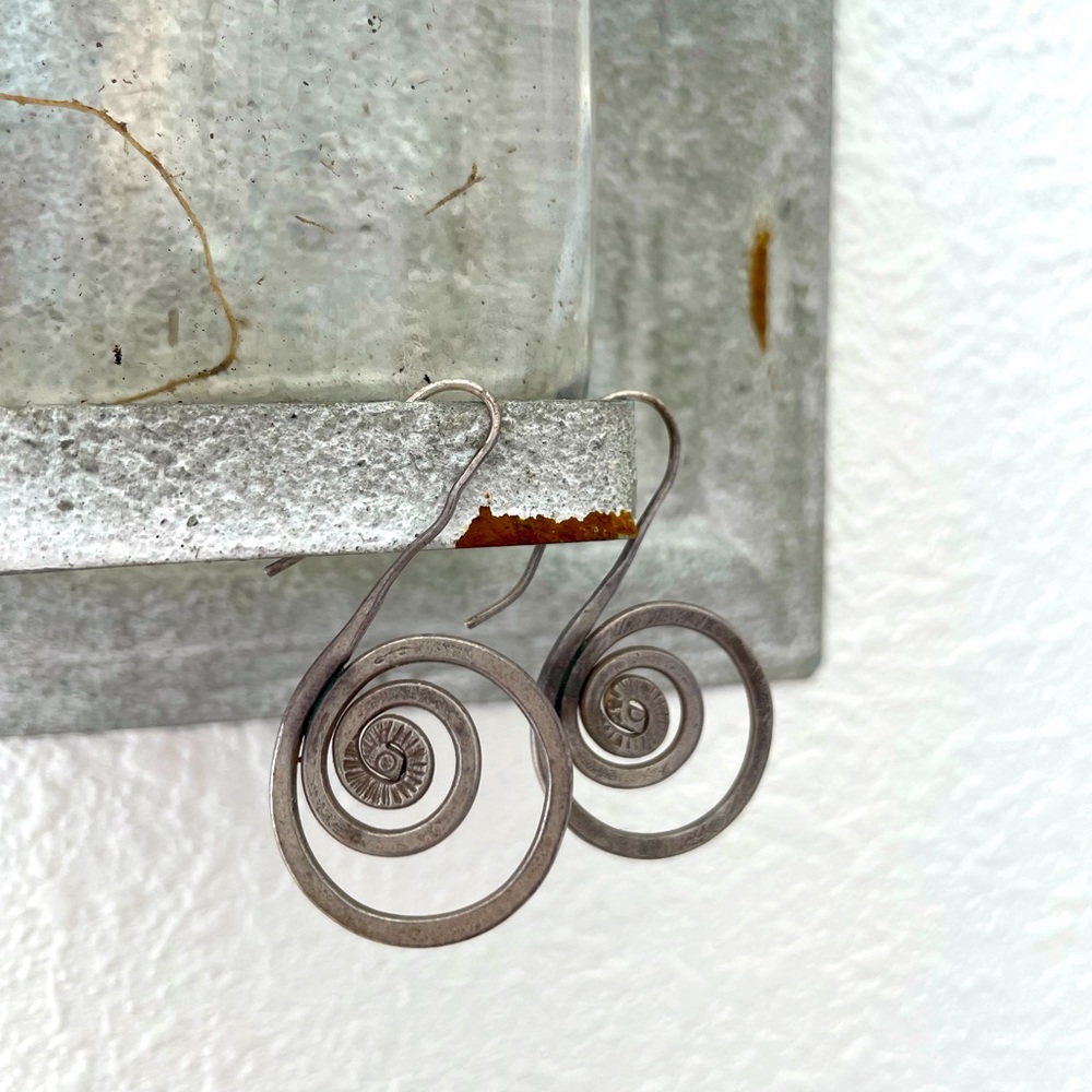 Sterling silver swirl hoop earrings